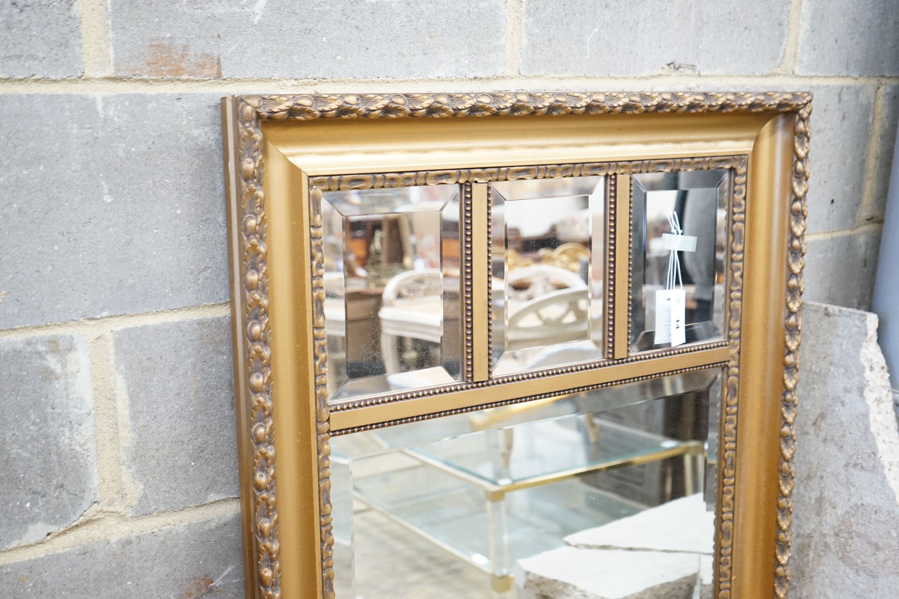 An early 20th century rectangular gilt frame four plate wall mirror, width 78cm, height 137cm